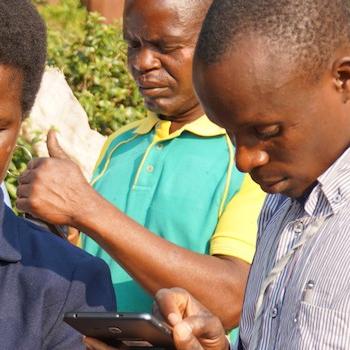 Data technicians in the Manica Province of Mozambique at a training to learn how to use the new m-SINAS tablets for mobile data collection. Photo credit: IWED Mozambique/ENGIRDO