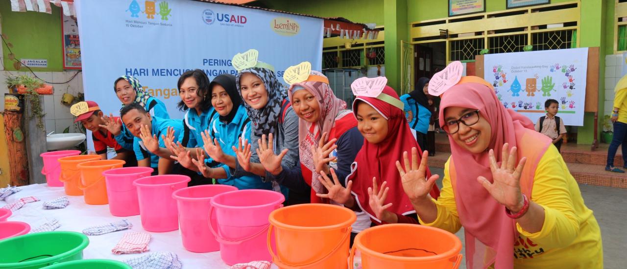 Schoolgirls in Indonesia showcase proper handwashing behavior