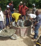 WASH entrepreneurs receive training in water pump construction. Photo credit: Global Communities Liberia