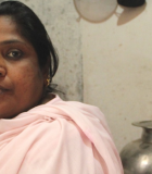 Ruksana Begum in her kitchen. Each day, she gets clean drinking water from a water purification center near her home in Bengaluru. Photo credit: Neha Khator, USAID