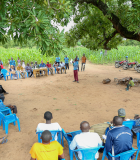A community gathers to discuss sanitation improvements in Ghana. Photo Credit: USAID/Ghana
