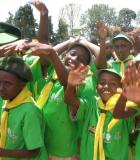 Students show off their clean hands during a Global Handwashing Day celebration in Kenya. Photo credit: USAID/WASHplus