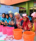 Schoolgirls in Indonesia showcase proper handwashing behavior