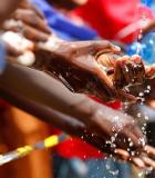 Kenyan students wash their hands. Photo credit: Reuters/Alamy